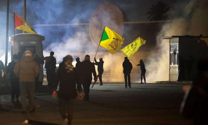 فصائل عراقية تتوعد باستهداف مصالح أمريكية وتتعهد بحماية حدود إيران